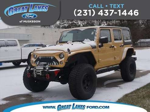 2014 Jeep Wrangler Unlimited Sahara - - by for sale in Muskegon, MI