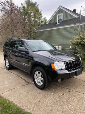 Jeep Grand Cherokee -Black - cars & trucks - by owner - vehicle... for sale in Grand Rapids, MI