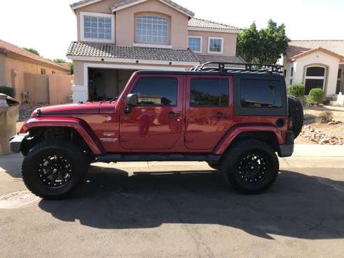 2012 Jeep Wrangler Unlimited Sahara 4D - cars & trucks - by owner -... for sale in Goodyear, AZ