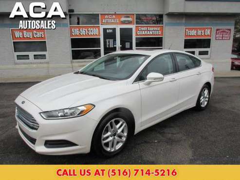 2014 Ford Fusion 4dr Sdn SE FWD Sedan - - by dealer for sale in Lynbrook, NY