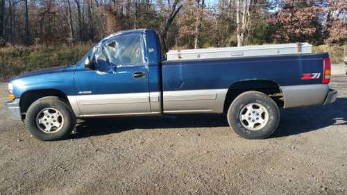 2001 CHEVROLET SILVERADO (4x4) VERY LOW MILES - cars & trucks - by... for sale in District Heights, District Of Columbia