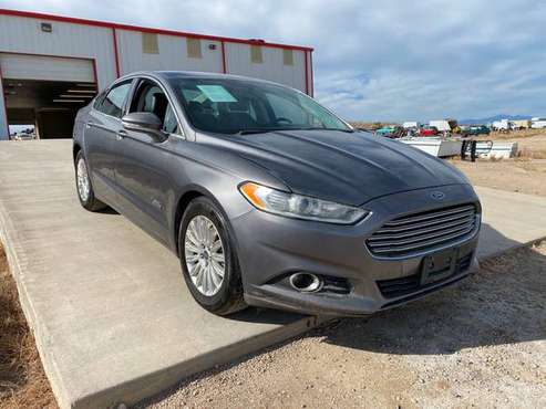 2014 FORD FUSION ENERGI SE FOR ONLY - cars & trucks - by dealer -... for sale in Pueblo, CO