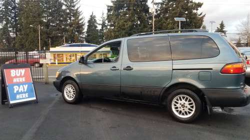APPROVED with NO CREDIT CHECKS 2000 Toyota Sienna CE - cars & trucks... for sale in Springfield, OR
