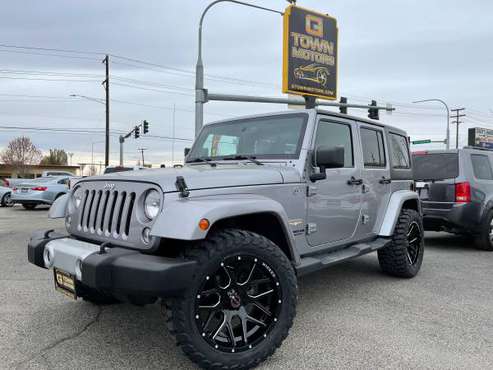 2014 Jeep Wrangler Unlimited Sahara - - by dealer for sale in Grandview, WA