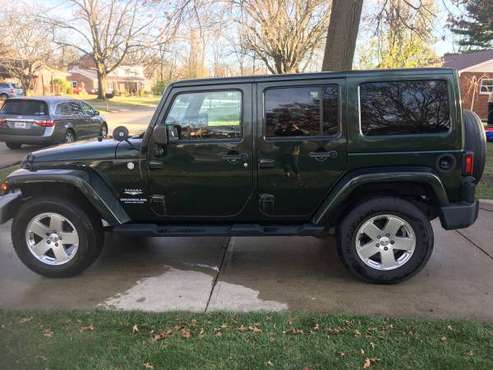 2011 Jeep Wrangler Unlimited Sahara 4dr SUV 4WD (3.8L 6cyl 6M) -... for sale in Edgewood, OH