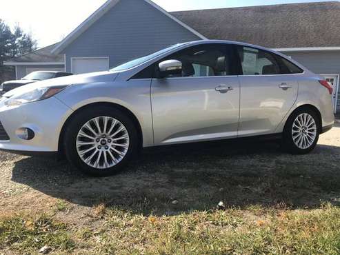 2012 Ford Focus Titanium - cars & trucks - by dealer - vehicle... for sale in Indianola, IA