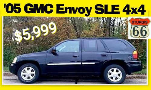 ** 2005 GMC Envoy 4x4 ** LOW Miles! ** BLACK - cars & trucks - by... for sale in O Fallon, MO
