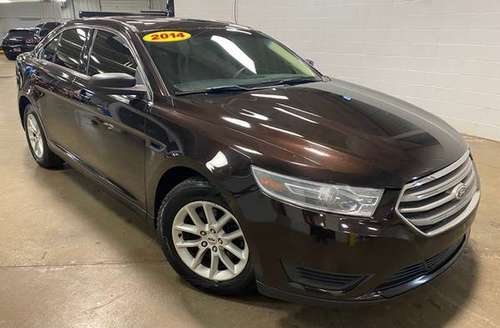 2014 Ford Taurus SE - - by dealer - vehicle automotive for sale in Coopersville, MI