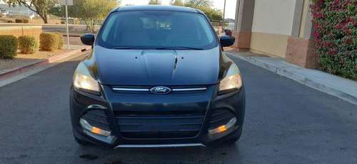 2014 FORD ESCAPE SE - cars & trucks - by owner - vehicle automotive... for sale in Tolleson, AZ