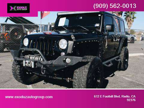 CUSTOMIZED 2015 JEEP WRANGLER 4X4 - cars & trucks - by dealer -... for sale in Rialto, CA