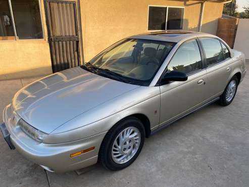 1999 SATURN SL - cars & trucks - by owner - vehicle automotive sale for sale in Fresno, CA
