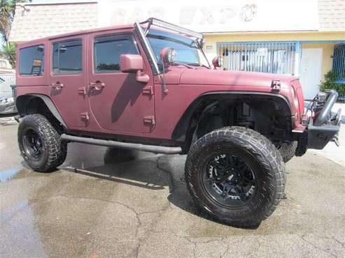 2012 Jeep Wrangler Unlimited Sport - cars & trucks - by dealer -... for sale in Downey, CA