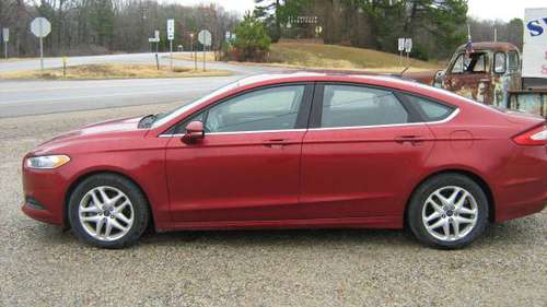 2015 Ford Fusion SE 4 door red - - by dealer - vehicle for sale in Harrisburg, AR