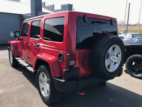 2011 Jeep Wrangler Unlimited Sahara - - by dealer for sale in Rogers, MN