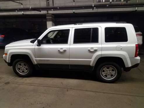 jeep Patriot 4WD Low Miles - cars & trucks - by owner - vehicle... for sale in Minneapolis, MN