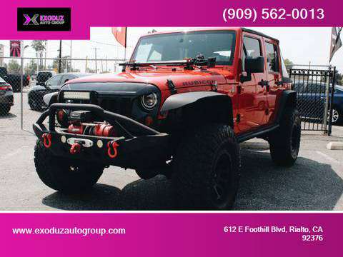 CUSTOMIZED 2011 JEEP RUBICON 4X4 - cars & trucks - by dealer -... for sale in Rialto, CA