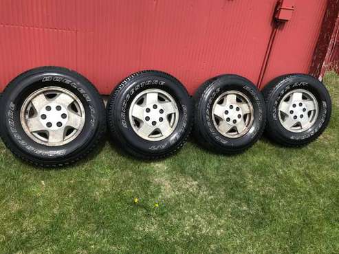 Four P245/75R16 Tires mounted on Chevy/GMC Aluminum Rims - cars & for sale in Puposky, MN