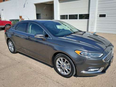2017 Ford Fusion SE, leather, nav, 80K miles - cars & trucks - by... for sale in Coldwater, KS