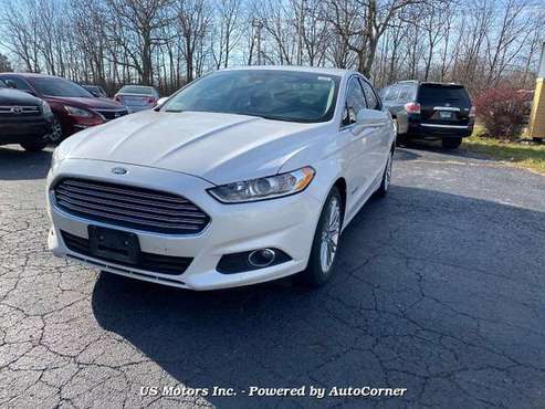 2013 Ford Fusion Hybrid - cars & trucks - by dealer - vehicle... for sale in Addison, IL