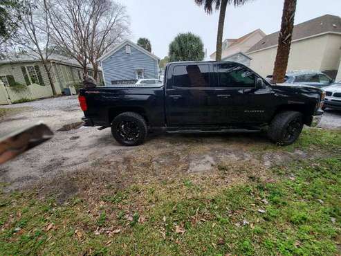 2014 Chevy Silverado 4WD - cars & trucks - by owner - vehicle... for sale in Molino, FL