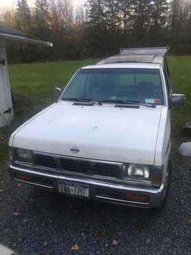 1997 Nissan XE d21 and Leer truck cap for sale in Ithaca, NY