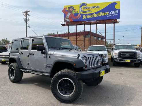 2013 Jeep Wrangler Unlimited Sport 4x4 4dr SUV - cars & trucks - by... for sale in Denver , CO