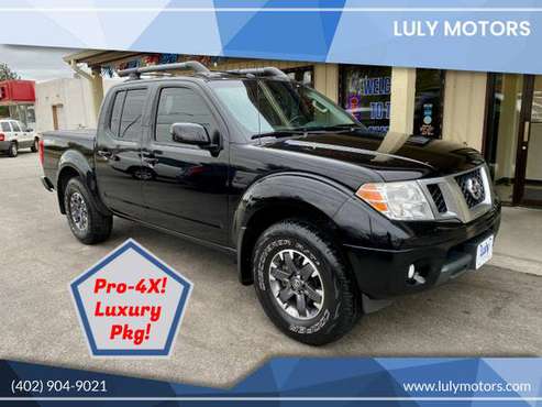 2014 Nissan Frontier Crew Cab Pro-4X 4WD - cars & trucks - by dealer... for sale in Lincoln, NE