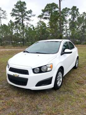 2013 Chevy Sonic LT Sedan 4D White Chevrolet Clean Title by Owner -... for sale in Saint Cloud, FL