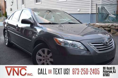 *2009* *Toyota* *Camry Hybrid* *Base 4dr Sedan* - cars & trucks - by... for sale in Paterson, NJ