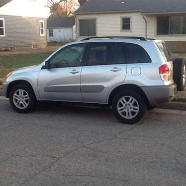 2001 Toyota RAV4 L, Silver 4 door - cars & trucks - by owner -... for sale in Hutchinson, KS