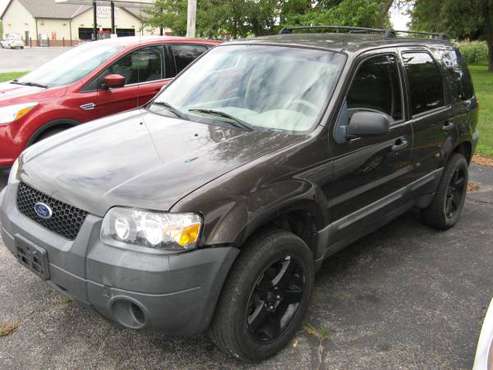 2007 FORD ESCAPE V6 4WD - cars & trucks - by dealer - vehicle... for sale in OSAWATOMIE, MO