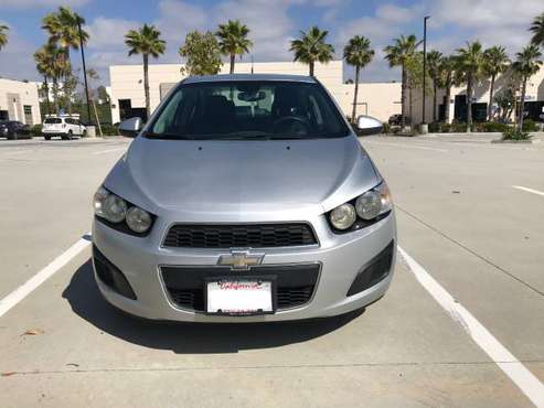2014 CHEVY SONIC LT LESS THAN 100K MILES - cars & trucks - by owner... for sale in Carlsbad, CA