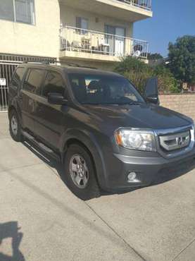 2009 Honda Pilot silver - cars & trucks - by owner - vehicle... for sale in Hawthorne, CA