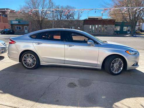 2014 Ford Fusion SE 4dr Sedan 144,531 miles - cars & trucks - by... for sale in Florence, CO