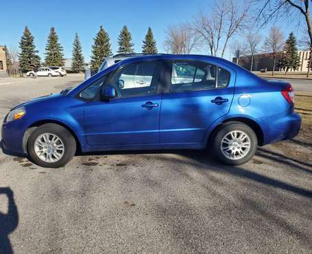 2012 Suzuki sx4 LE - cars & trucks - by owner - vehicle automotive... for sale in Fargo, ND