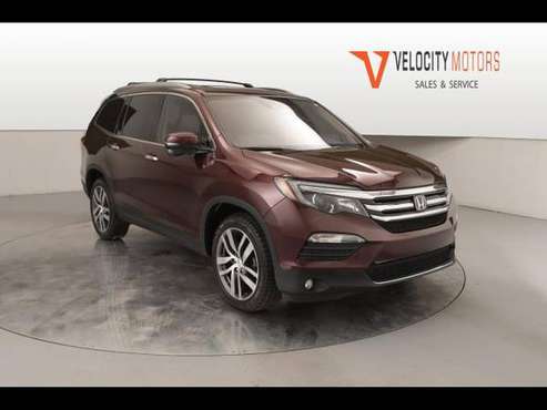 2017 Honda Pilot Touring 4WD - cars & trucks - by dealer - vehicle... for sale in Caledonia, MI