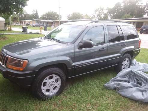 02 grand cherokee. New motor, and tires for sale in Titusville, FL