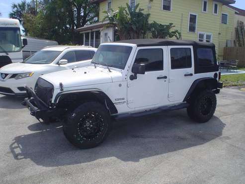 14 Florida Jeep wrangler nds rebuilt fixer 74kk new top - cars & for sale in Merritt Island, FL