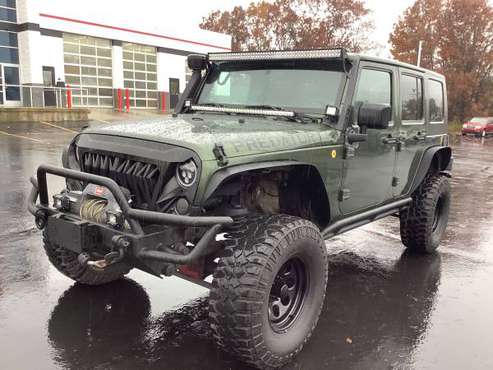 Tough! 2008 Jeep Wrangler Unlimited X! 4x4! Lifted! Guaranteed... for sale in Ortonville, MI