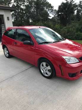 2007 2door Ford Focus SES 79K miles RED manual stick shift - cars &... for sale in Lehigh Acres, FL