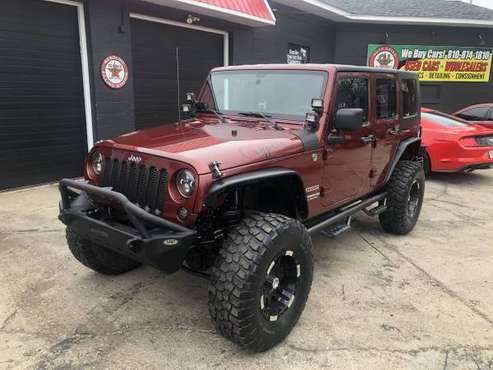 2010 JEEP WRANGLER UNLIMITED **WOW** MUST SEE - cars & trucks - by... for sale in Fenton, MI