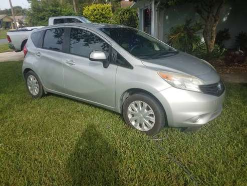2014 Nissan Versa 5 spd - cars & trucks - by owner - vehicle... for sale in Edgewater, FL