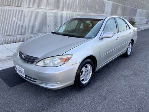 2002 TOYOTA CAMRY LE. DRIVES LIKE NEW!! - cars & trucks - by dealer... for sale in Arleta, CA