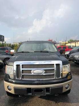2009 *Ford* *F-150* *4WD SuperCab 145 XLT* Black for sale in Houston, TX