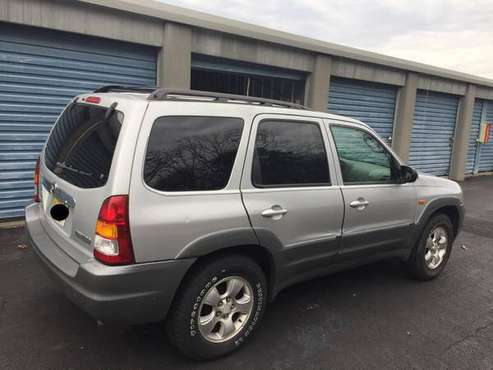 MAZDA Tribute low miles 4WD - cars & trucks - by owner - vehicle... for sale in Manasquan, NJ