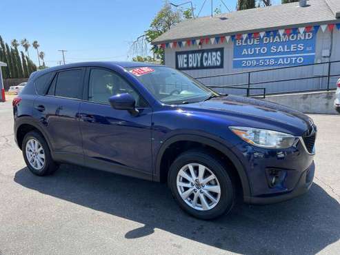 2013 Mazda CX-5 Touring AWD Gas Saver HUGE SALE - cars & for sale in CERES, CA