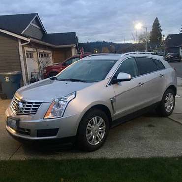 2015 Silver SRX-4 AWD Cadillac - cars & trucks - by owner - vehicle... for sale in Monroe, WA