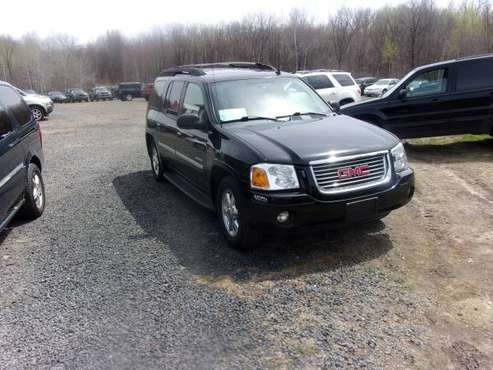 2006 GMC Envoy 4X4 (3rd row seat) Only (160K miles) - cars & trucks... for sale in fall creek, WI