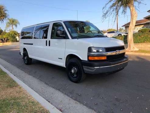 CRAZY LOW MILES! Two Chevy Express Passenger Vans 15 PASSENGER -... for sale in Whittier, CA