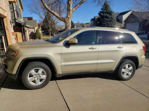 2012 Jeep Grand Cherokee Laredo SUV Gold - cars & trucks - by owner... for sale in Broomfield, CO